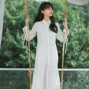 站在秋千上的文艺女生头像图片,氛围感直接拉满